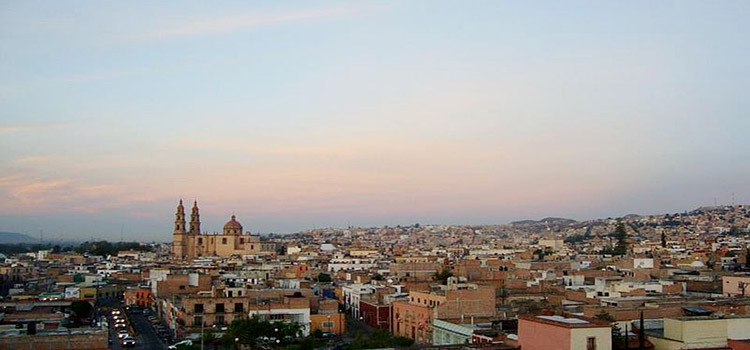 Wikipedia-nAmanecer en Lagos de Moreno (Parroquia de la Asunción de María)-Edgar eaoe- “Editada”- https://bit.ly/2yTY443